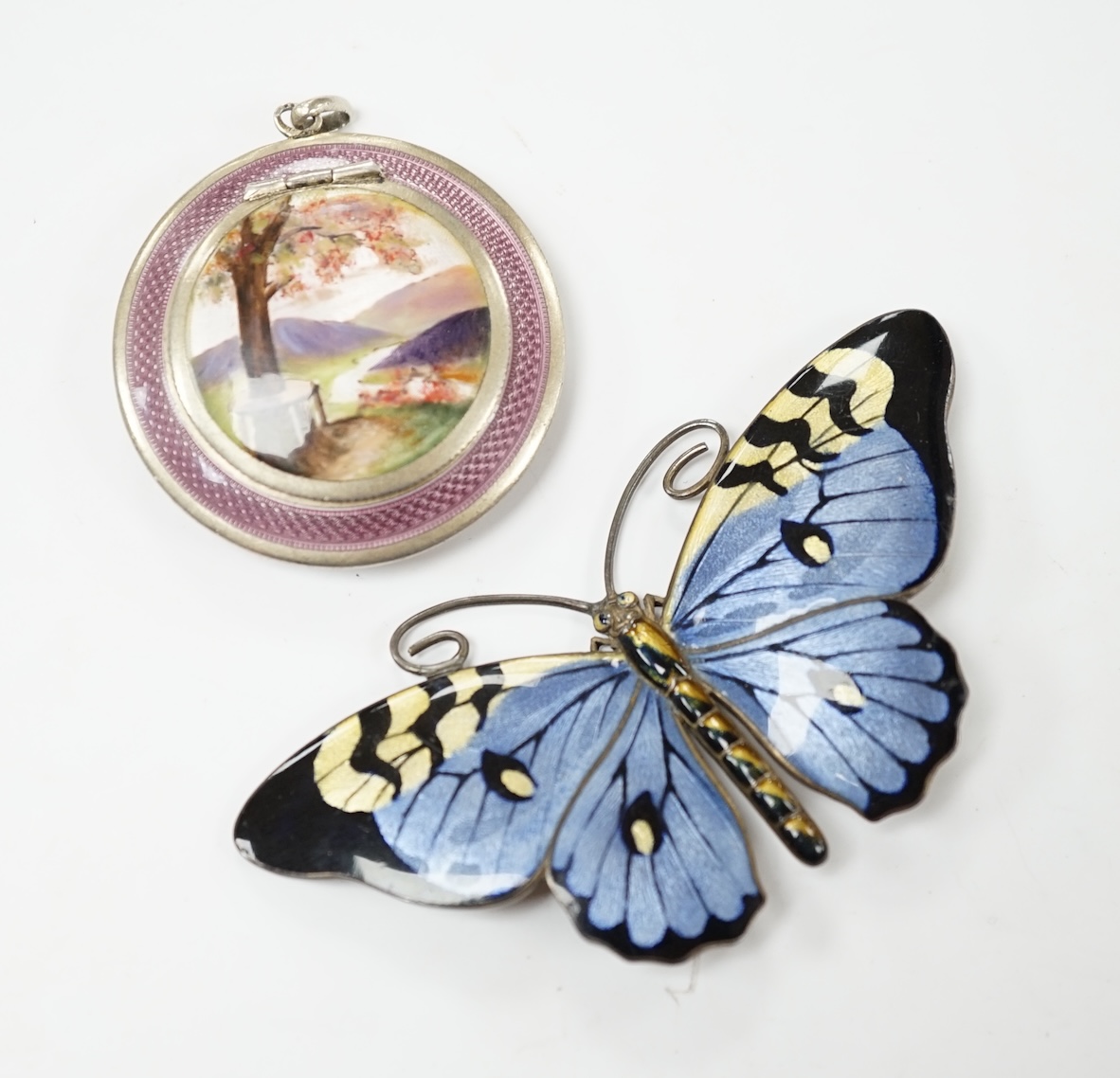 A Norwegian 925S and three colour enamel butterfly brooch, 8cm and a gilt white metal and enamel compact. Condition - poor to fair.